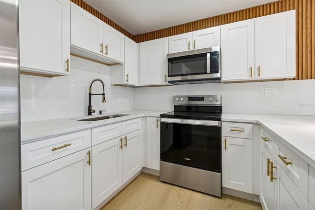 7910 W POWHATAN AVENUE, Tampa, FL 33615