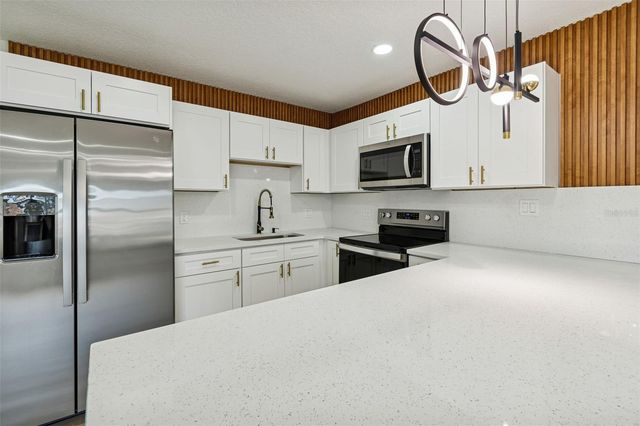 7910 W POWHATAN AVENUE, Tampa, FL 33615