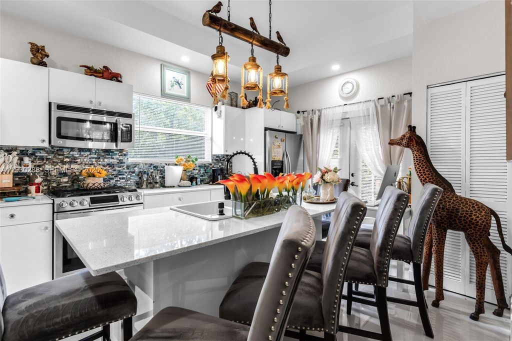 Image 15 of property listing at 16020 SW 208th Ave, Miami, FL 33187