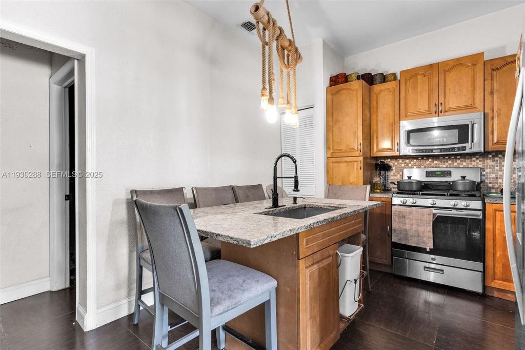 Image 22 of property listing at 16020 SW 208th Ave, Miami, FL 33187