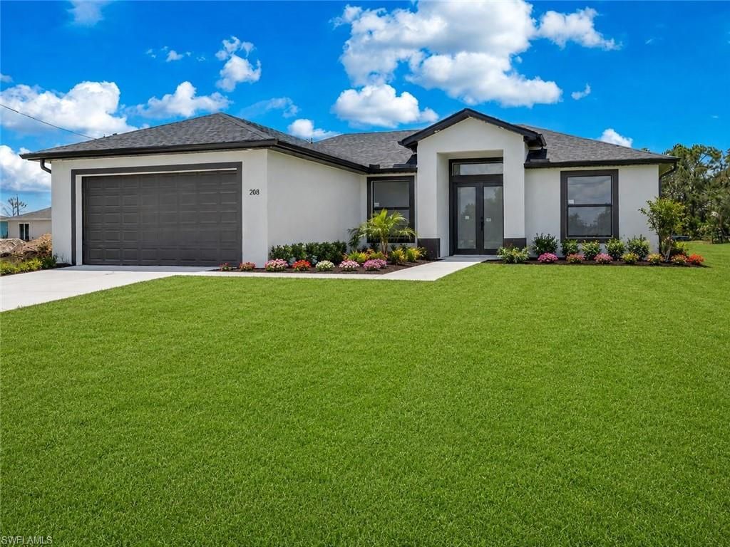 208 PEMBROKE ST, LEHIGH ACRES, FL 33974 — exterior