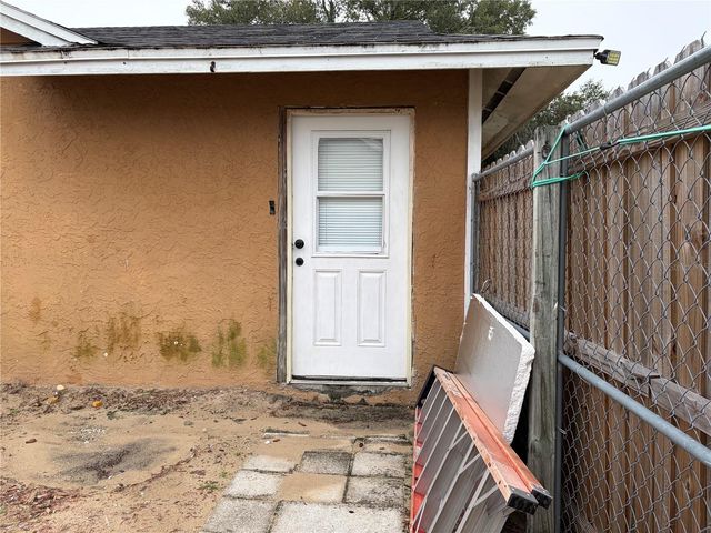 1311 WOODMAN WAY, Orlando, FL 32818