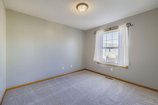 11305 Fergus Street NE F, Blaine, MN 55449