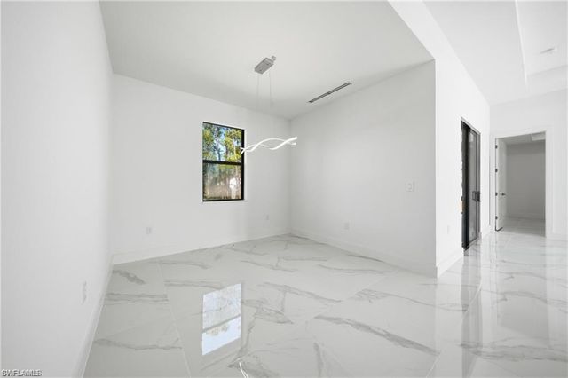 303 McArthur AVE, Lehigh Acres, FL 33936