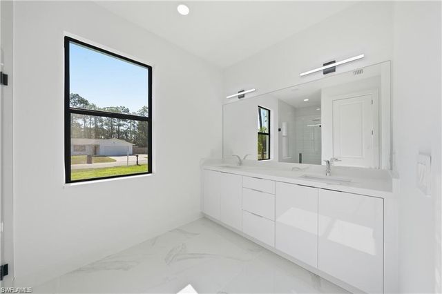 303 McArthur AVE, Lehigh Acres, FL 33936