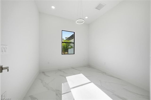303 McArthur AVE, Lehigh Acres, FL 33936