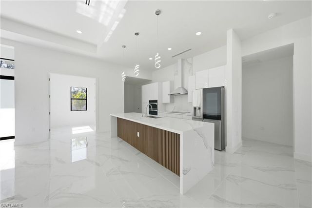 303 McArthur AVE, Lehigh Acres, FL 33936