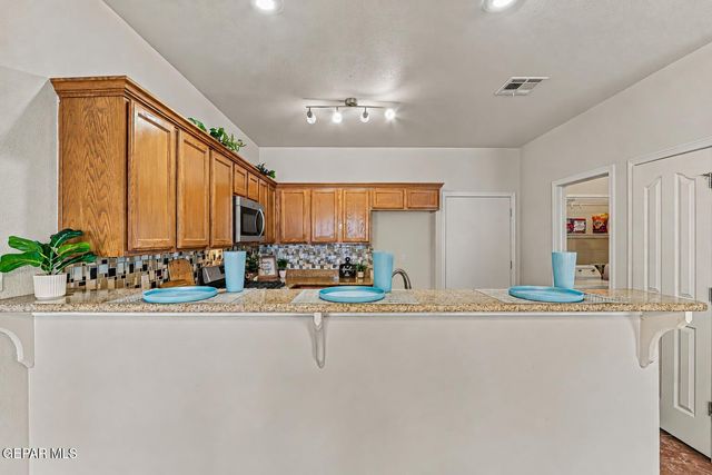 6781 PARQUE DEL SOL Drive, El Paso, TX 79911