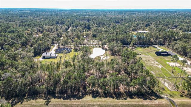 10114 Woodlane Boulevard, Magnolia, TX 77354