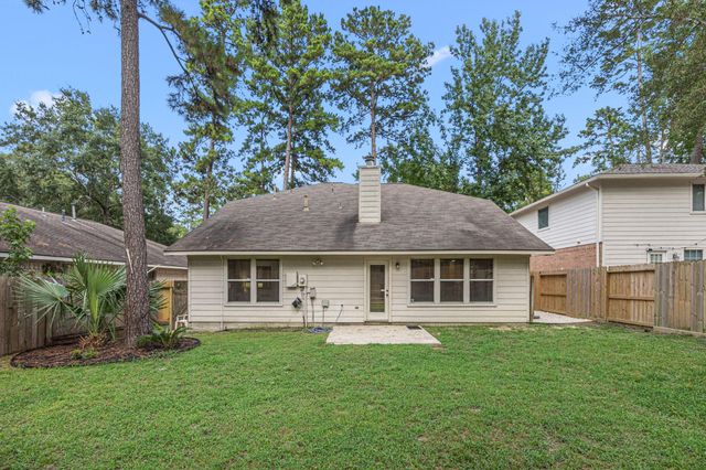 202 W Misty Dawn Dr, The Woodlands, TX 77385