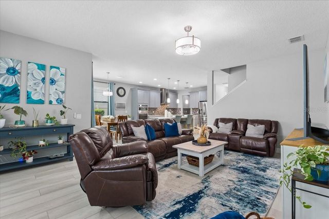 1675 FEATHER GRASS LOOP, Lutz, FL 33558