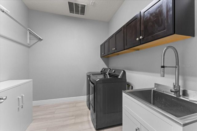 1675 FEATHER GRASS LOOP, Lutz, FL 33558