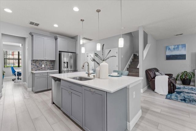 1675 FEATHER GRASS LOOP, Lutz, FL 33558