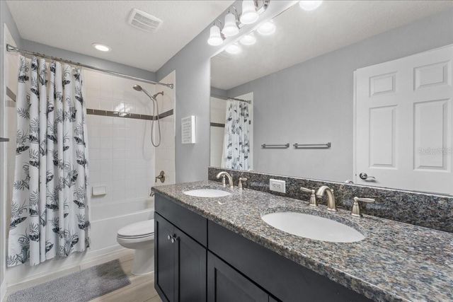 1675 FEATHER GRASS LOOP, Lutz, FL 33558