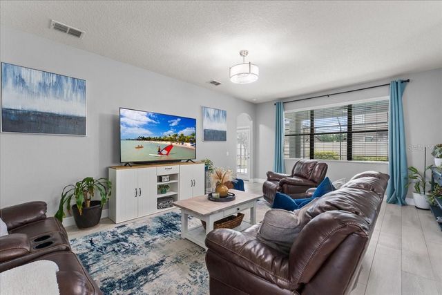 1675 FEATHER GRASS LOOP, Lutz, FL 33558