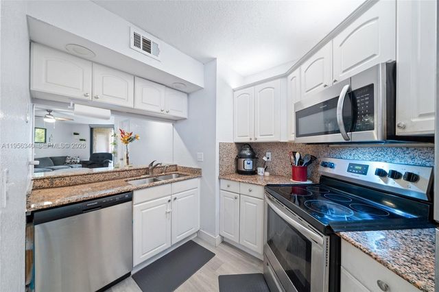 10551 W Broward Boulevard 408, Plantation, FL 33324