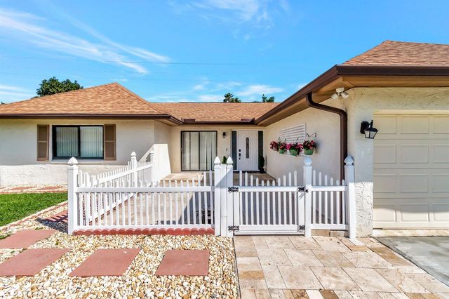 10298 Greentrail Drive N, Boynton Beach, FL 33436
