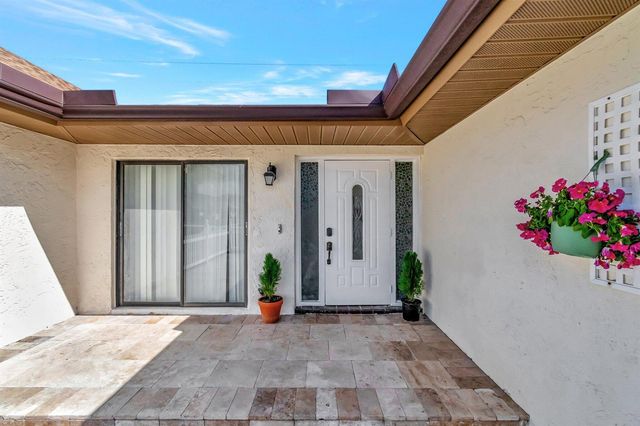 10298 Greentrail Drive N, Boynton Beach, FL 33436