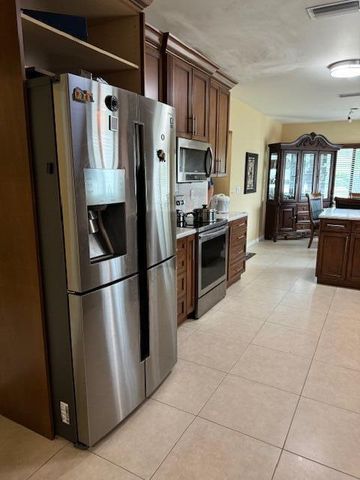 10298 Greentrail Drive N, Boynton Beach, FL 33436