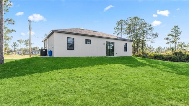 1125 DUTCHESS ST E, Lehigh Acres, FL 33974