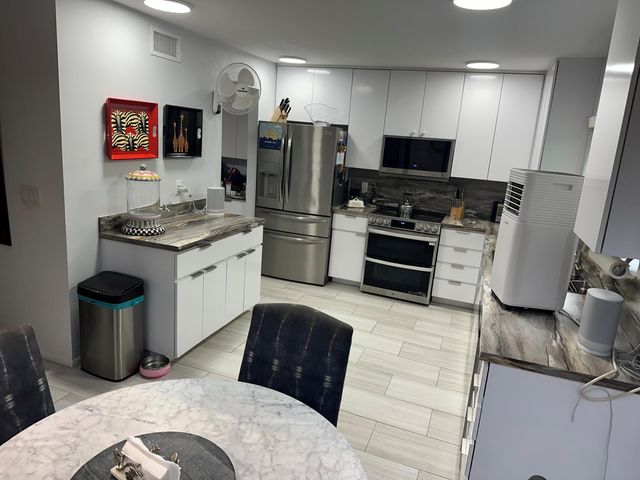 7362 Woodmont Court, Boca Raton, FL 33434