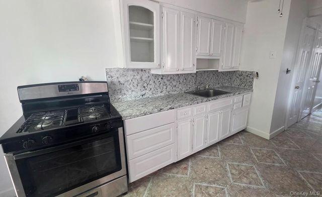 9504 23rd Avenue, East Elmhurst, NY 11369