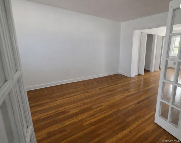 9504 23rd Avenue, East Elmhurst, NY 11369
