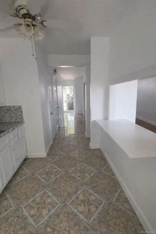 9504 23rd Avenue, East Elmhurst, NY 11369