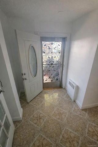 9504 23rd Avenue, East Elmhurst, NY 11369