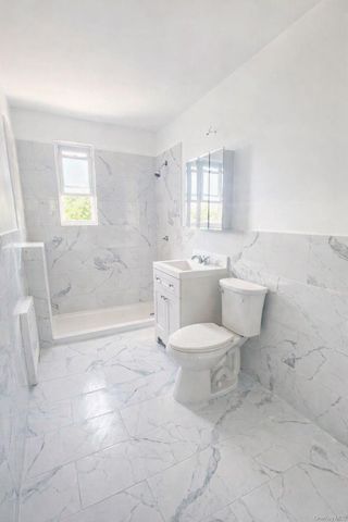 9504 23rd Avenue, East Elmhurst, NY 11369