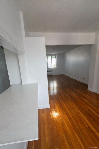 9504 23rd Avenue, East Elmhurst, NY 11369