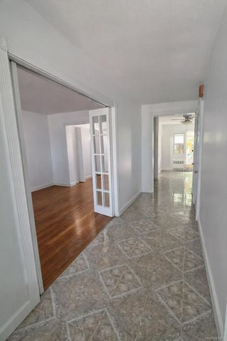 9504 23rd Avenue, East Elmhurst, NY 11369