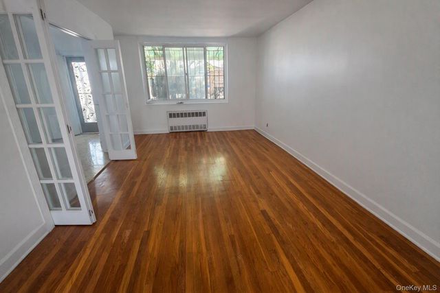 9504 23rd Avenue, East Elmhurst, NY 11369