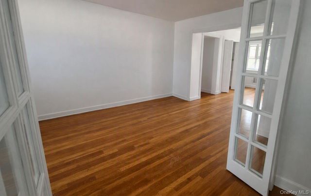 9504 23rd Avenue, East Elmhurst, NY 11369