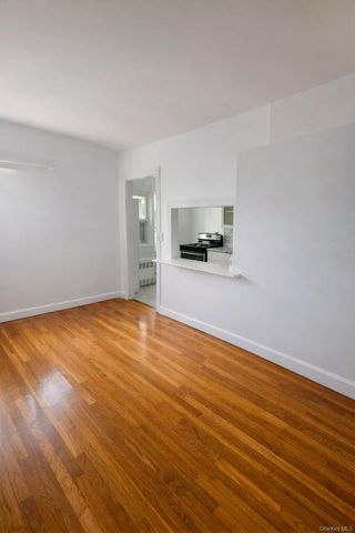 9504 23rd Avenue, East Elmhurst, NY 11369