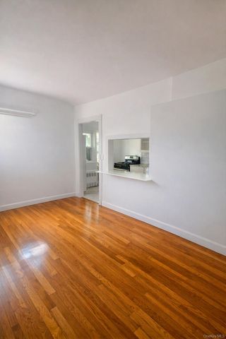 9504 23rd Avenue, East Elmhurst, NY 11369