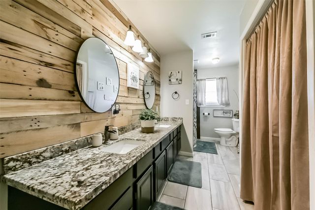 5511 Carriage Trails Drive, Mont Belvieu, TX 77523