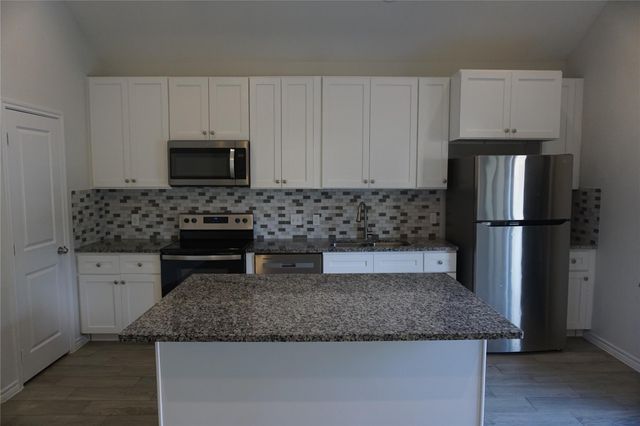 9773 Blackgum Street, Willis, TX 77318