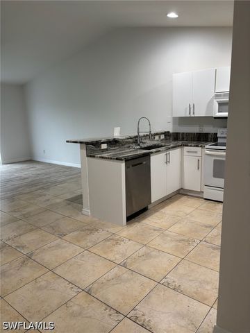 4713 13th ST SW, Lehigh Acres, FL 33973