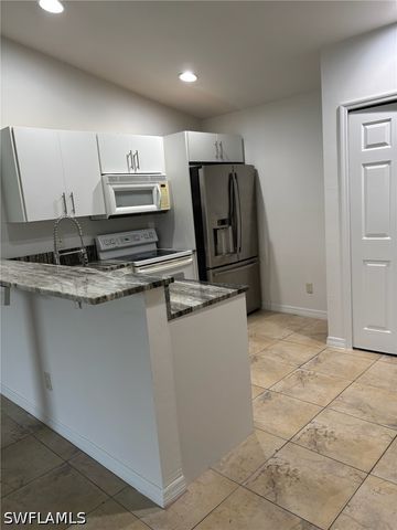 4713 13th ST SW, Lehigh Acres, FL 33973