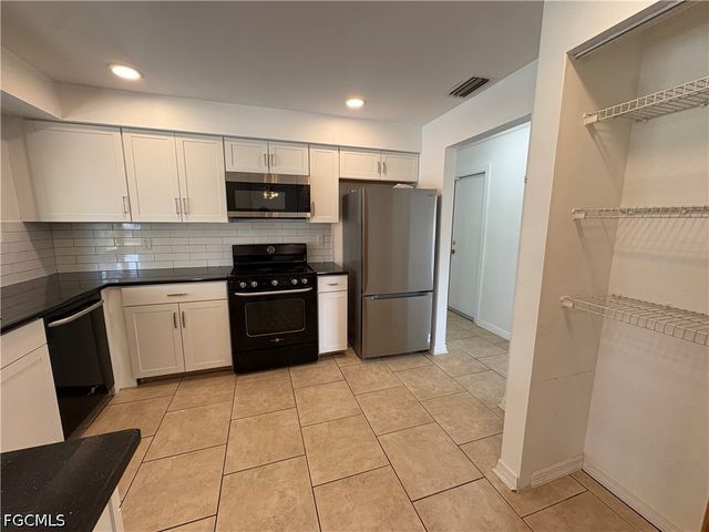 311 SW 48th TER, Cape Coral, FL 33914