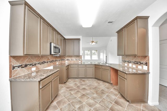 10606 Sun River Falls Drive, Humble, TX 77396