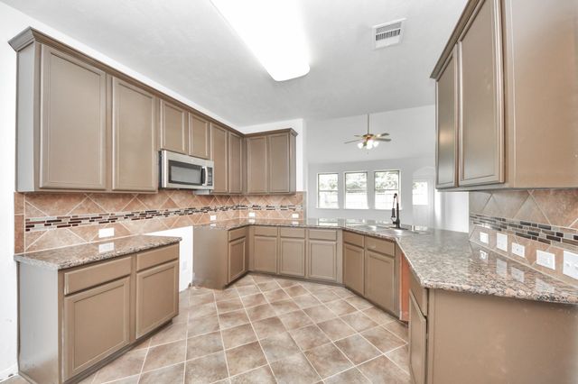 10606 Sun River Falls Drive, Humble, TX 77396