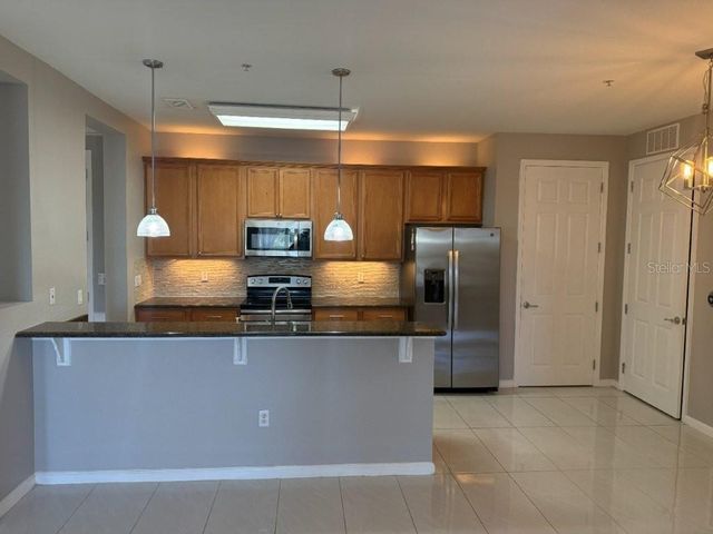 3368 ROBERT TRENT JONES DRIVE 301, Orlando, FL 32835