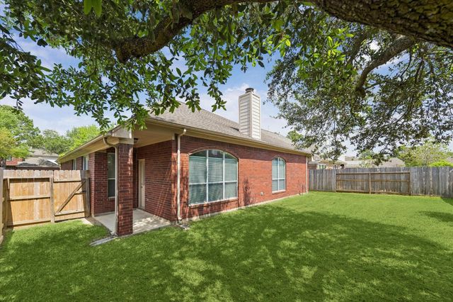 11707 Mesa Wells Drive, Tomball, TX 77377