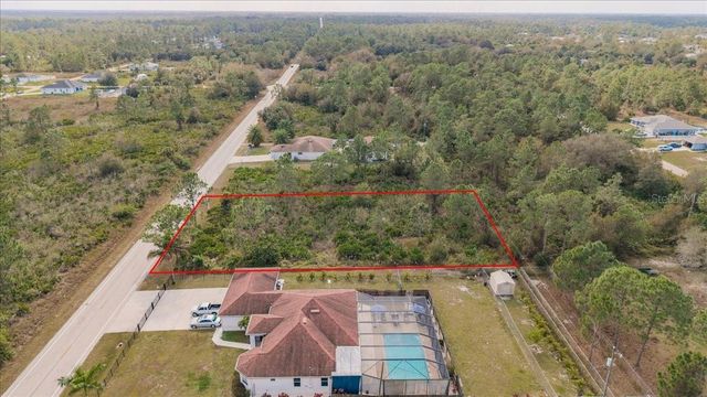 1413 RICHMOND AVENUE N, Lehigh Acres, FL 33972