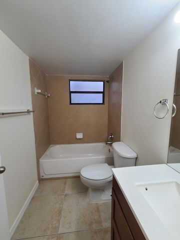 1547 LAKE CRYSTAL Drive A, West Palm Beach, FL 33411