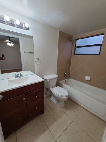 1547 LAKE CRYSTAL Drive A, West Palm Beach, FL 33411