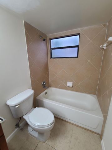 1547 LAKE CRYSTAL Drive A, West Palm Beach, FL 33411