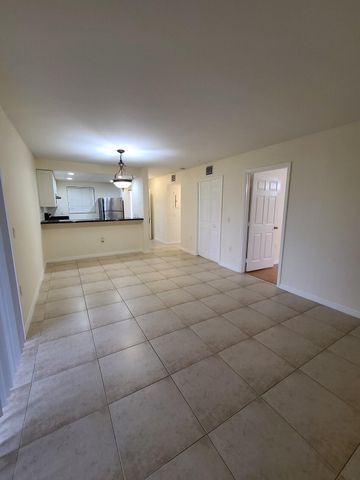 1547 LAKE CRYSTAL Drive A, West Palm Beach, FL 33411